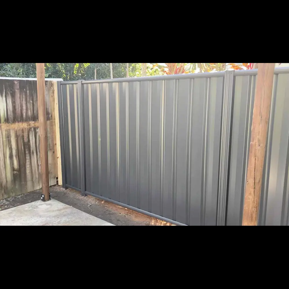 Modern grey Colorbond privacy fence enclosing a Cairns backyard